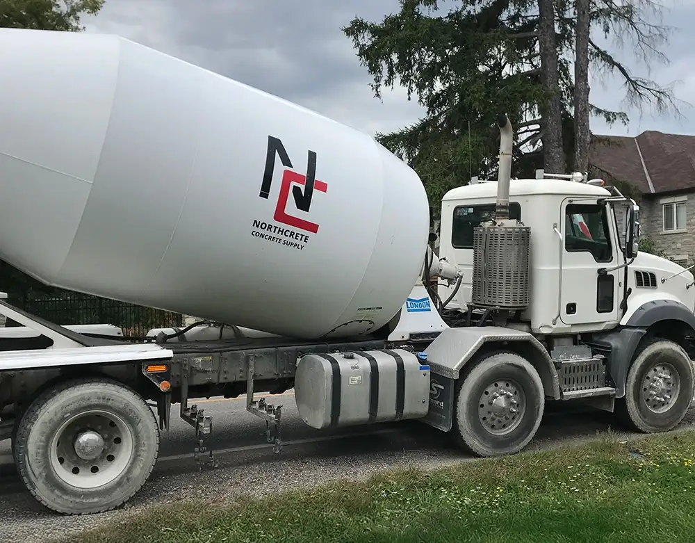 A landscape frame of a Northcrete Concrete Supply concrete mixer truck.