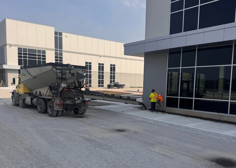 A stone slinger truck at work.